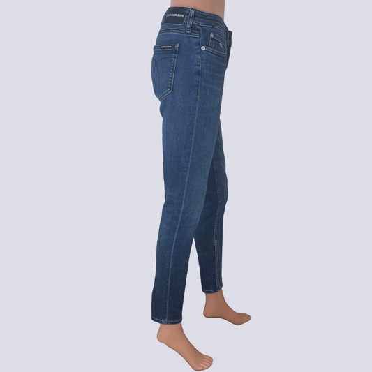 Side view of the Calvin Klein Mid Rise Skinny Ankle Jeans