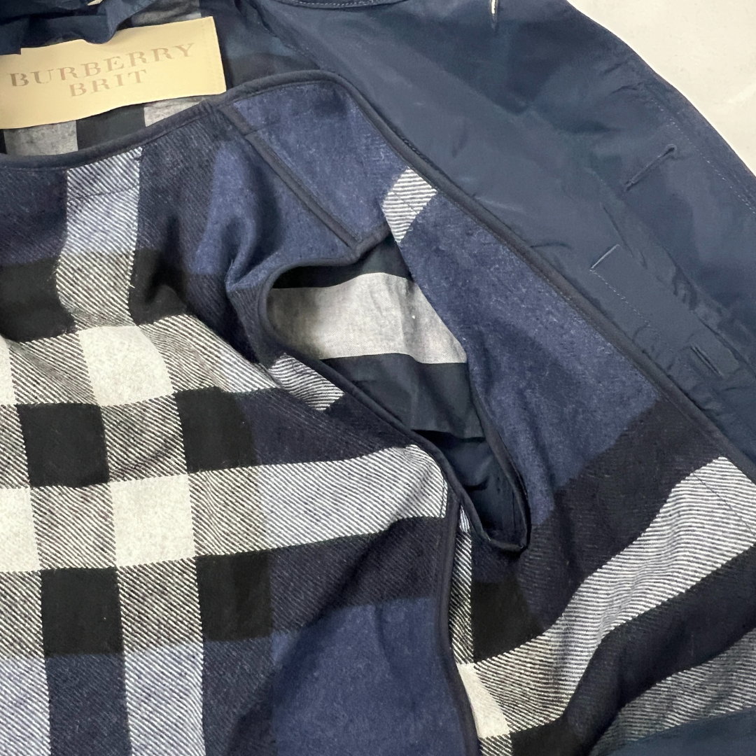 Front inner view of the Women's Burberry Brit Raincoat