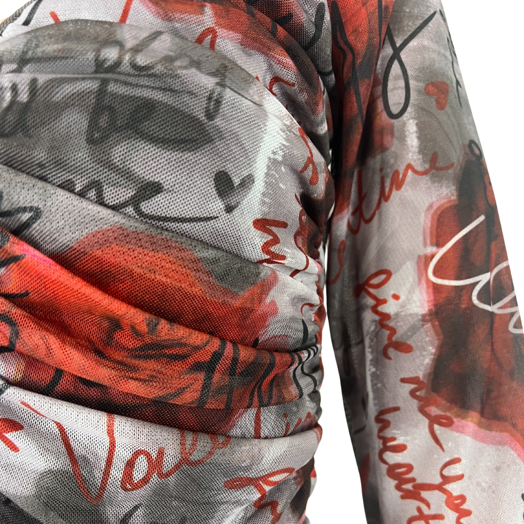 Front detail view of the Valleygirl Floral Sheer Top
