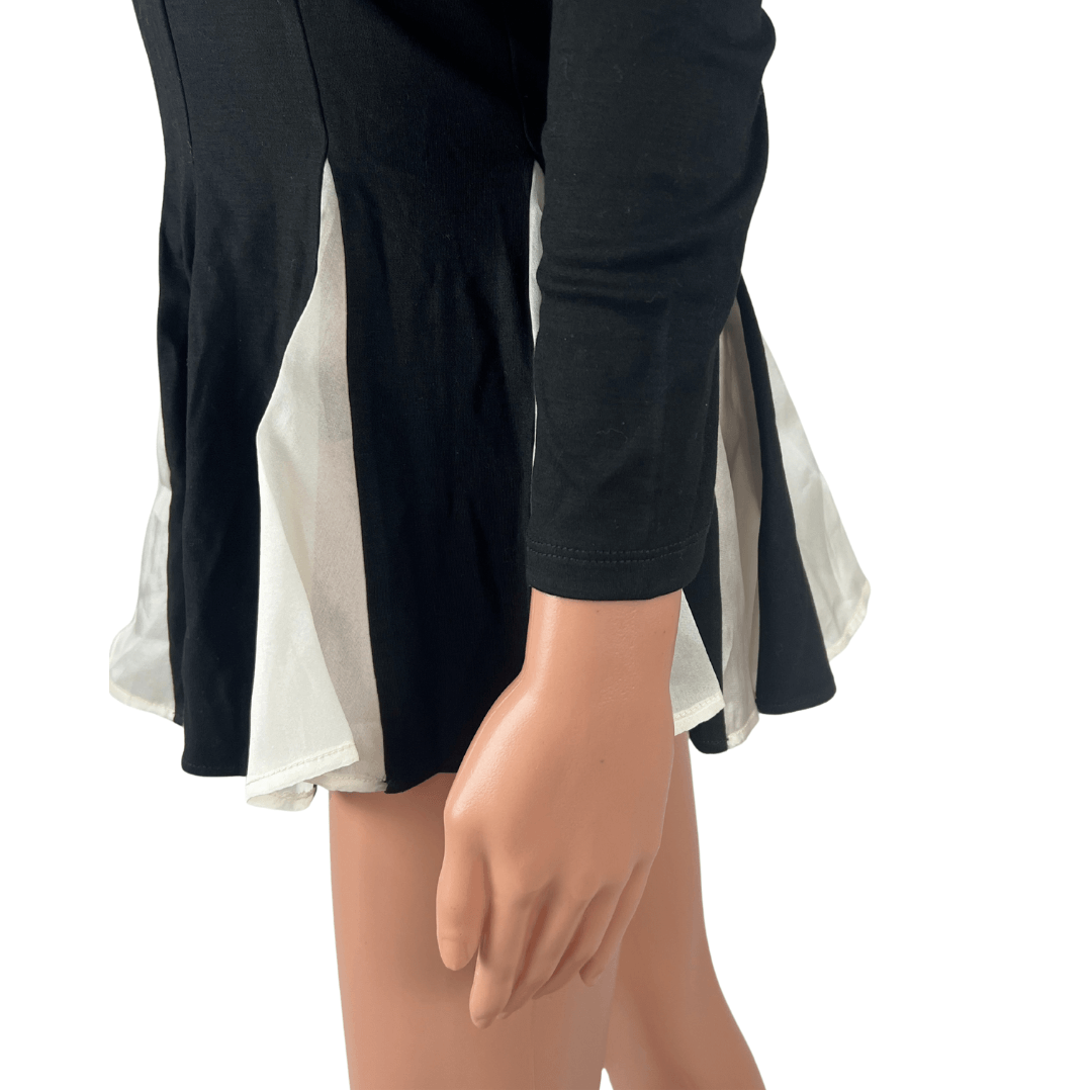 Side hem view of the ODTF Off the Shoulder Top