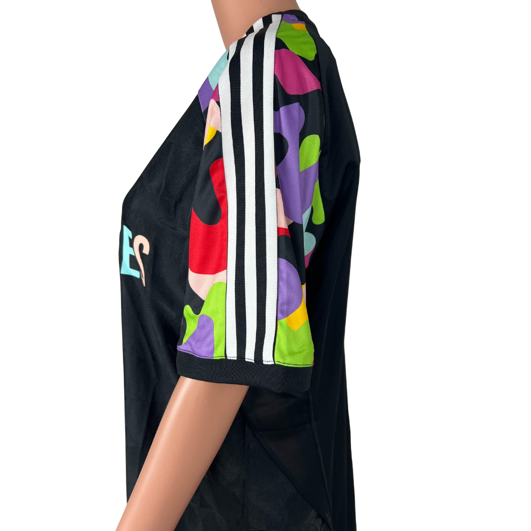 Side view of the Adidas Men's Love Unites Tiro Jersey