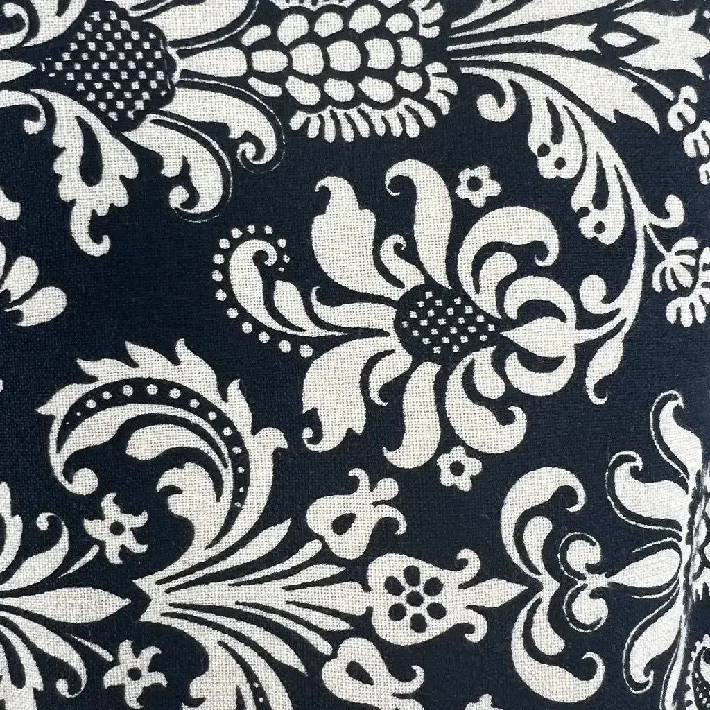 Fabric Detail View of the Andiamo Midi Black and Cream Brocade Coat