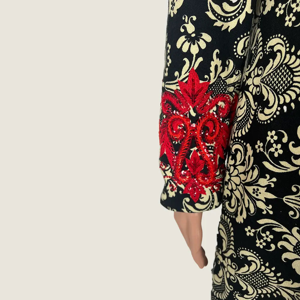 Side Sleeve View of the Andiamo Midi Black and Cream Brocade Coat