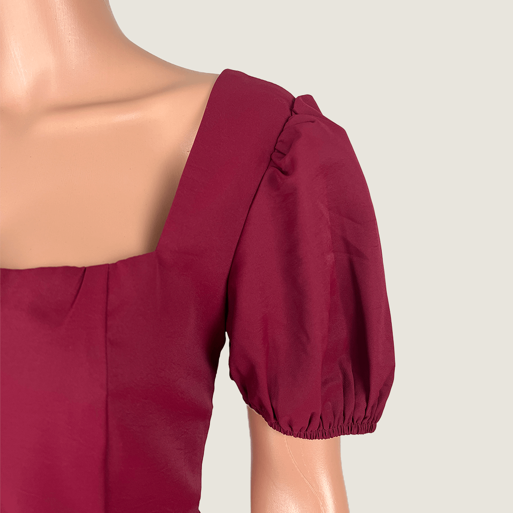Side Sleeve detail view of the Atmos&Here Burgundy Cap Sleeve Midi Dress