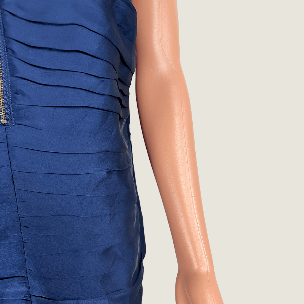 Side close up view of the pleated fabric on the Banana Republic sleeve pleated top