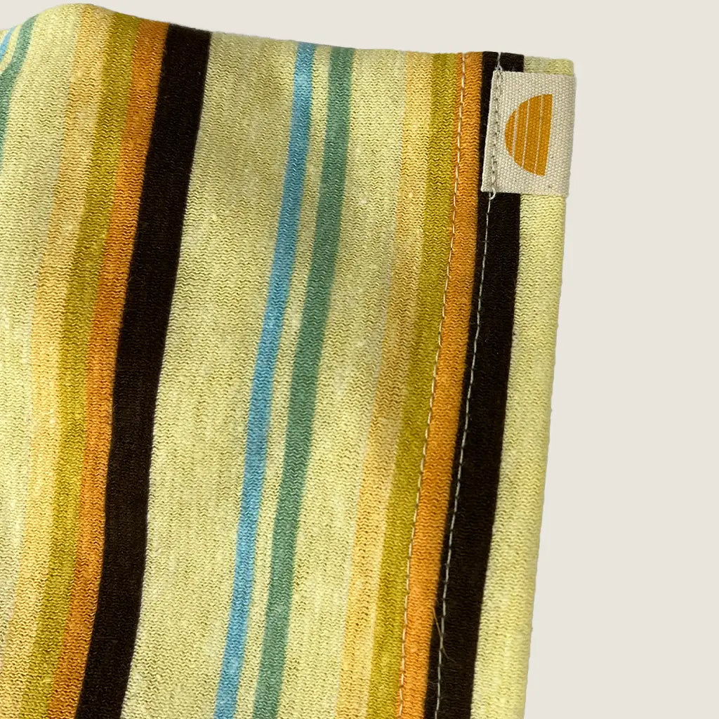 Front Hem Detail of Banabae Rad Dad Brights Stripe Hemp Tee