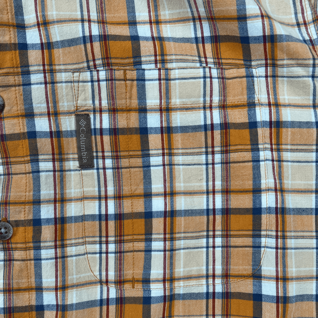 Front pocket detail view of the Columbia men's checkered shirt