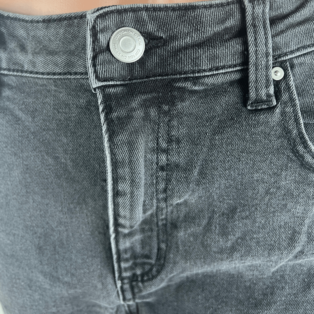 Front detail view of the Cotton On Black Jeans