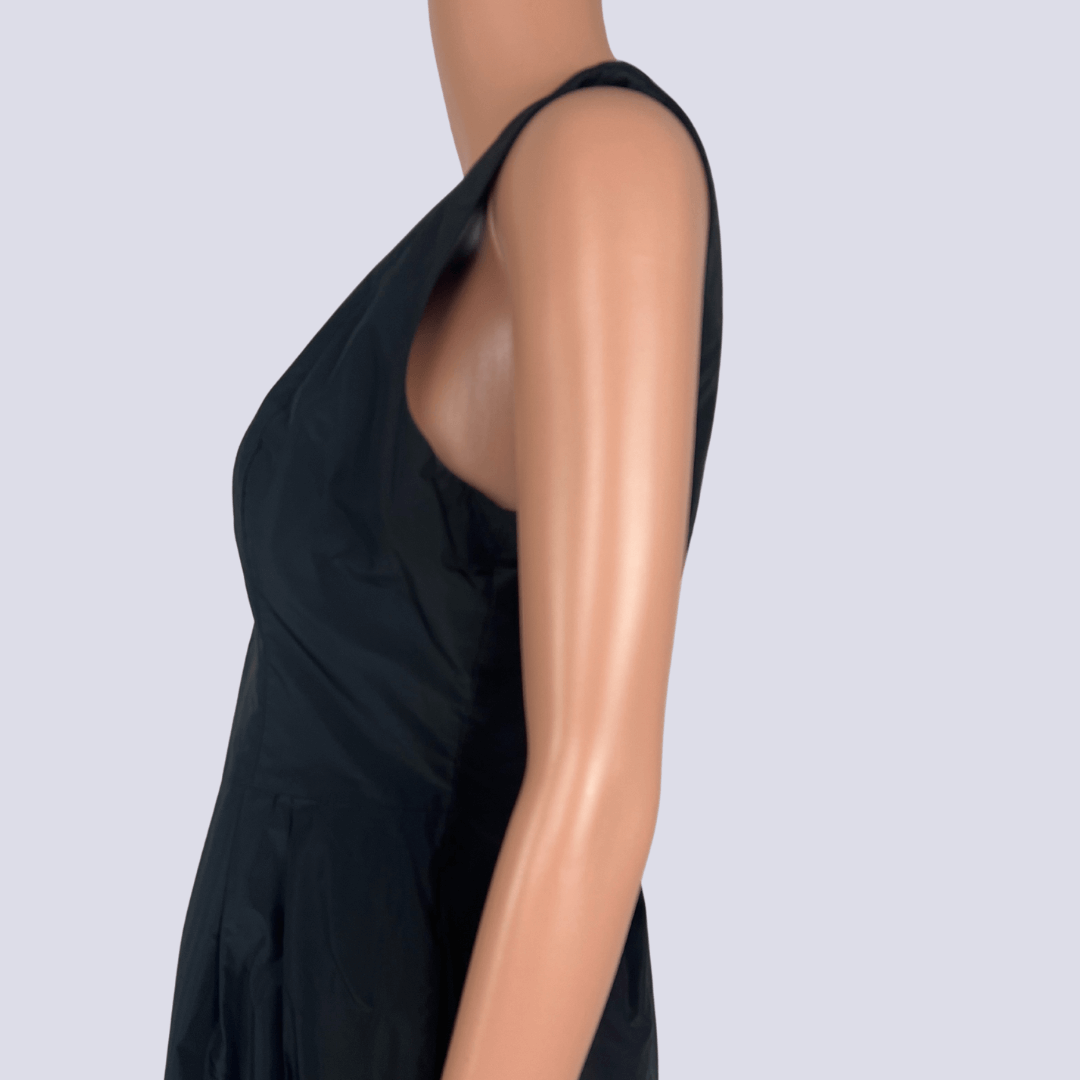 Side detail view of the Cue sleeveless black dress