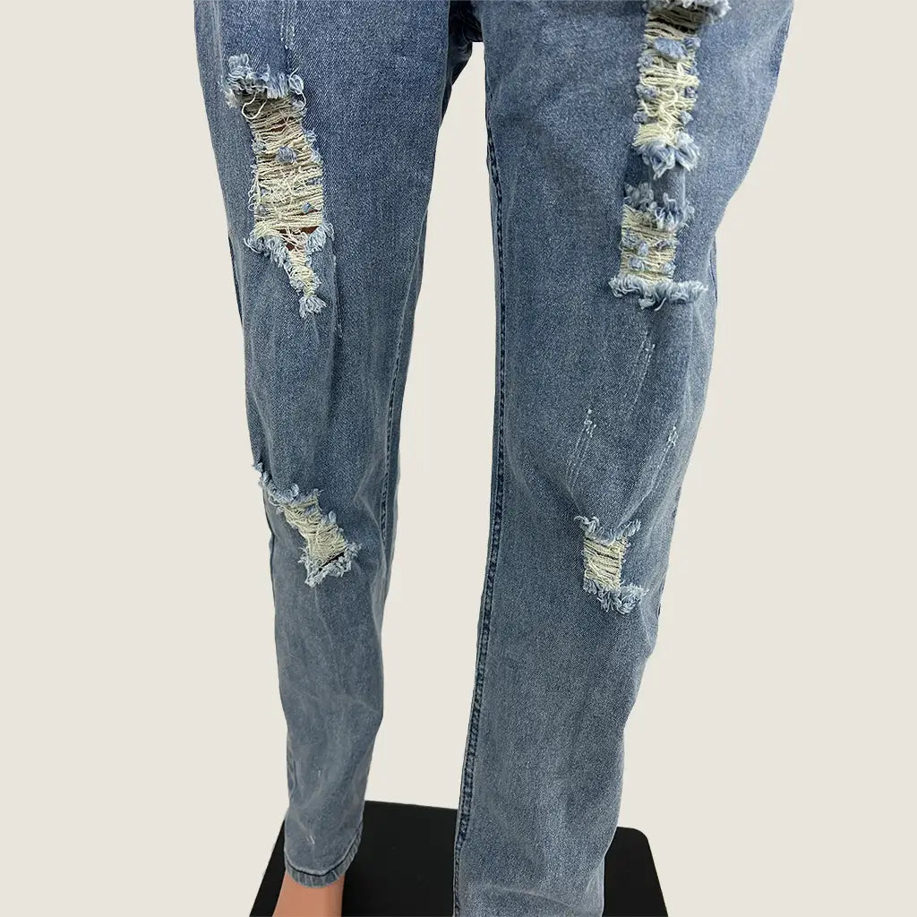 Back Legs Detail View of the Women's Distressed Denim Overalls