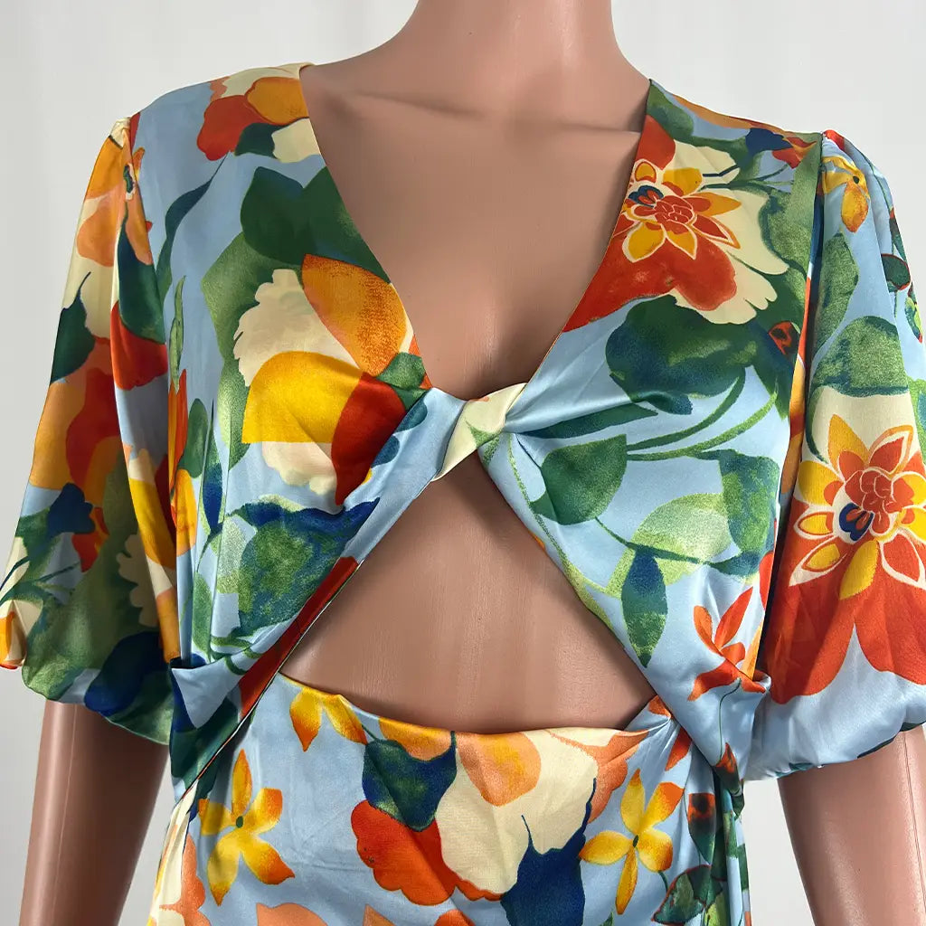 Front Detail of the Cut Out on the Divine Avenue Midi Floral Dress Front Cut Out