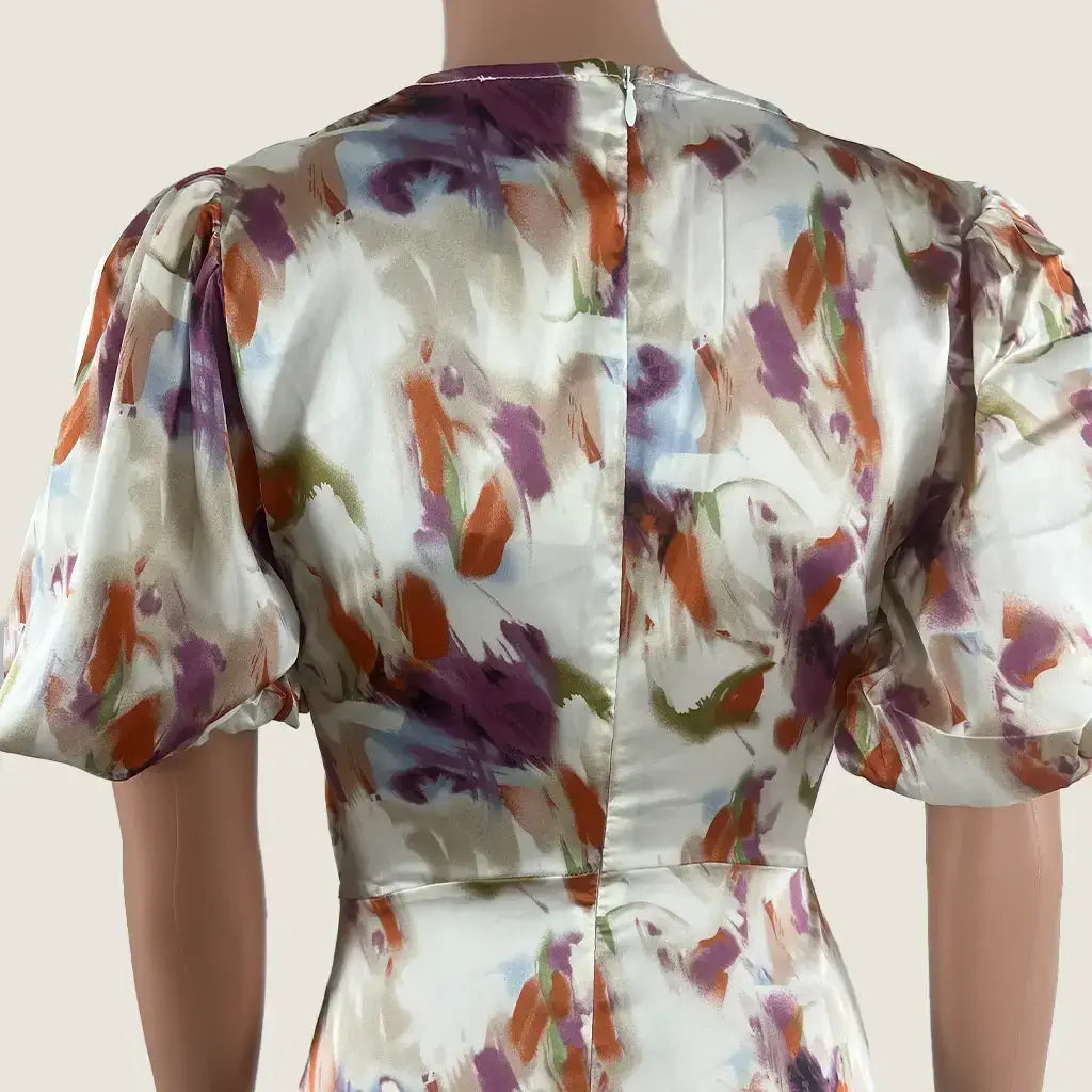 Back Detail View of the Divine Avenue Midi Abstract Print With Front Cut Out Dress
