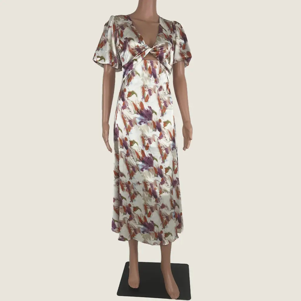 Front View of the Divine Avenue Midi Abstract Print With Front Cut Out Dress
