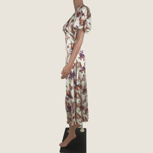 Side View of the Divine Avenue Midi Abstract Print With Front Cut Out Dress