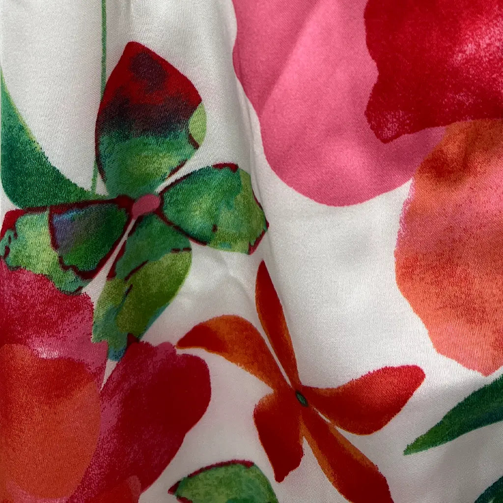 Fabric Detail View of the Divine Avenue Midi Marigold Floral Dress Front Cut Out
