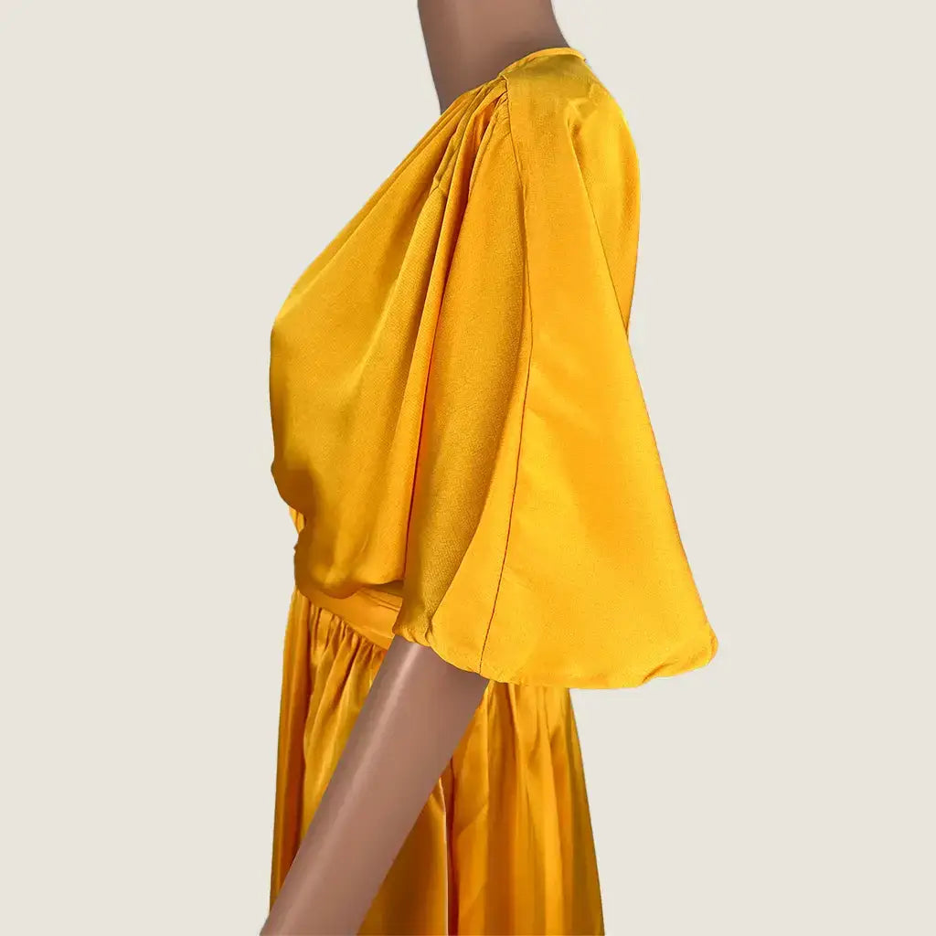 Side Detail View of the Divine Avenue Orange Summer Midi Dress