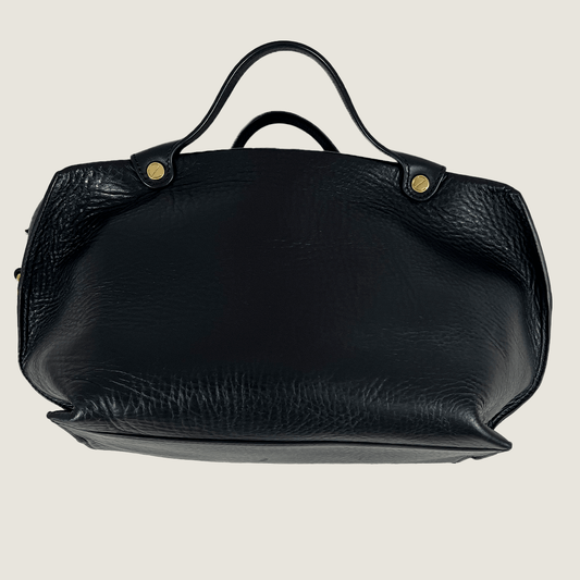 Side View of the Ecco Black Sculptured Handbag