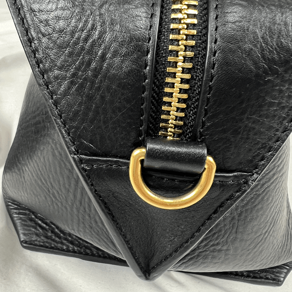 Zip Close Up View of the Ecco Black Sculptured Handbag
