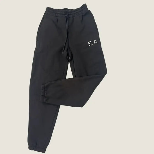 Front view of the pants in the Enhanced Apparel Women's Tracksuit Set