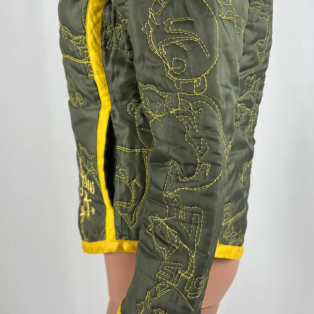 Side Detail View of the Gsus Sindustries Woman's Fitted Quilted Jacket Patched