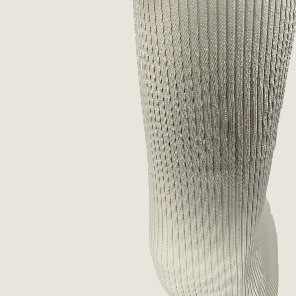 Front close up view of the ribbed fabric on the Henne Lara Rib Midi Skirt