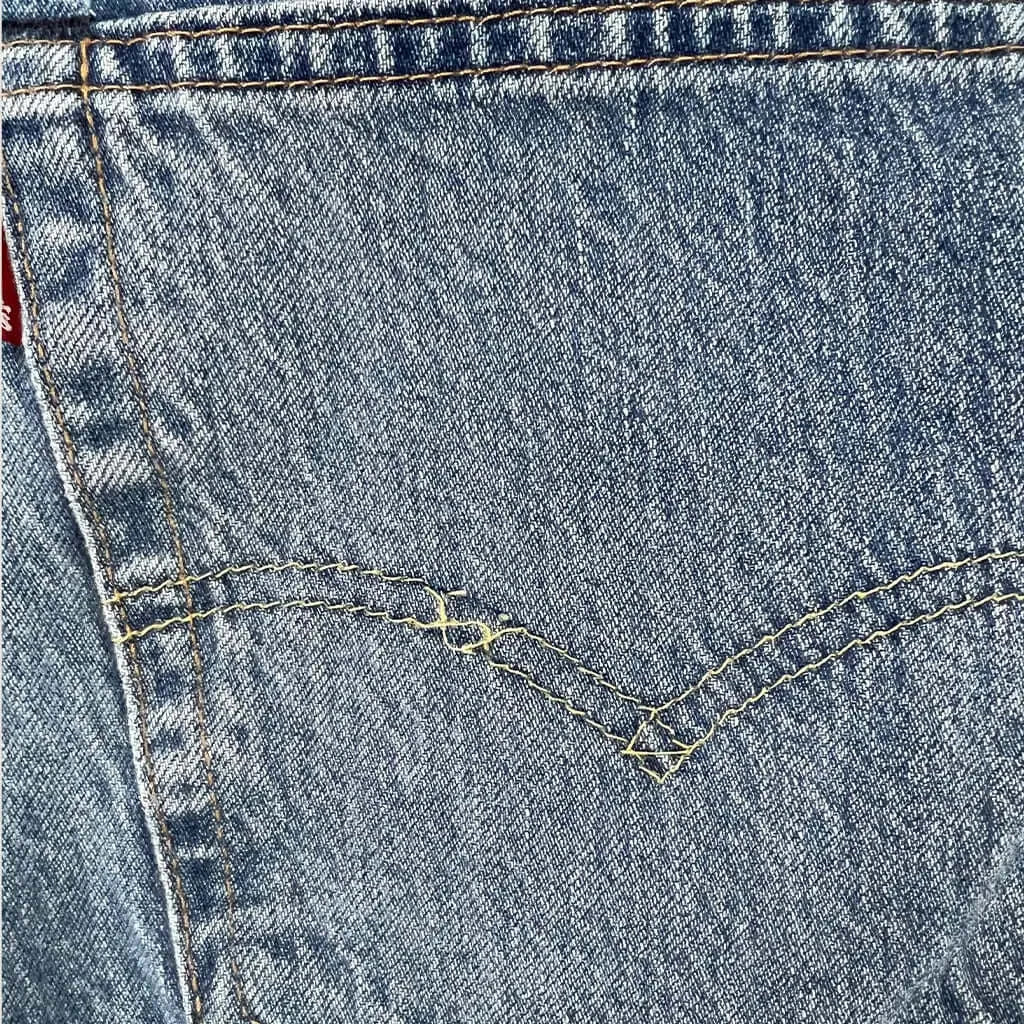 Loose stitching view of the Men's Levis 512 Jeans