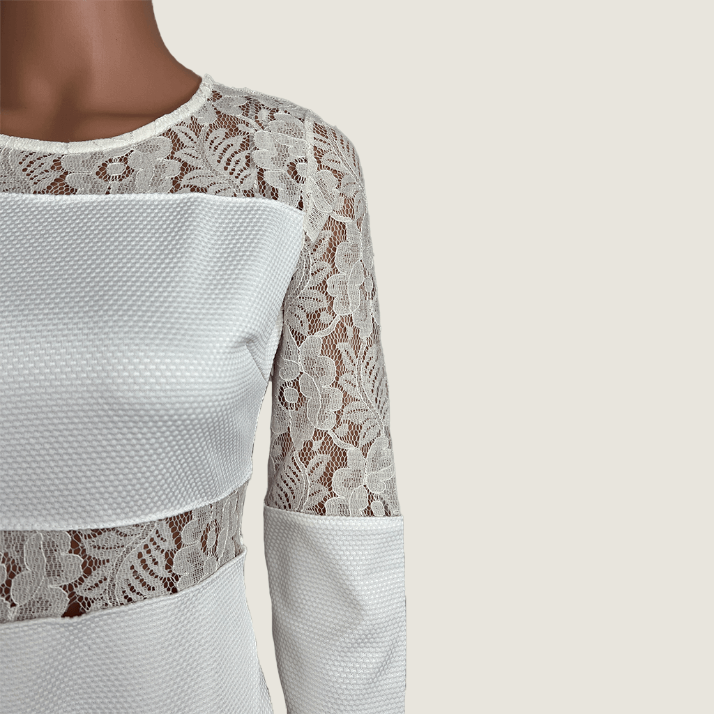 Close up front view of Levantine White Cut Out Midi Dress