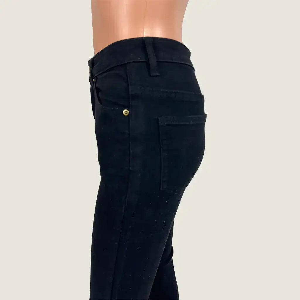 Side Detail View of the Little Lies Black Mid Rise Jeans