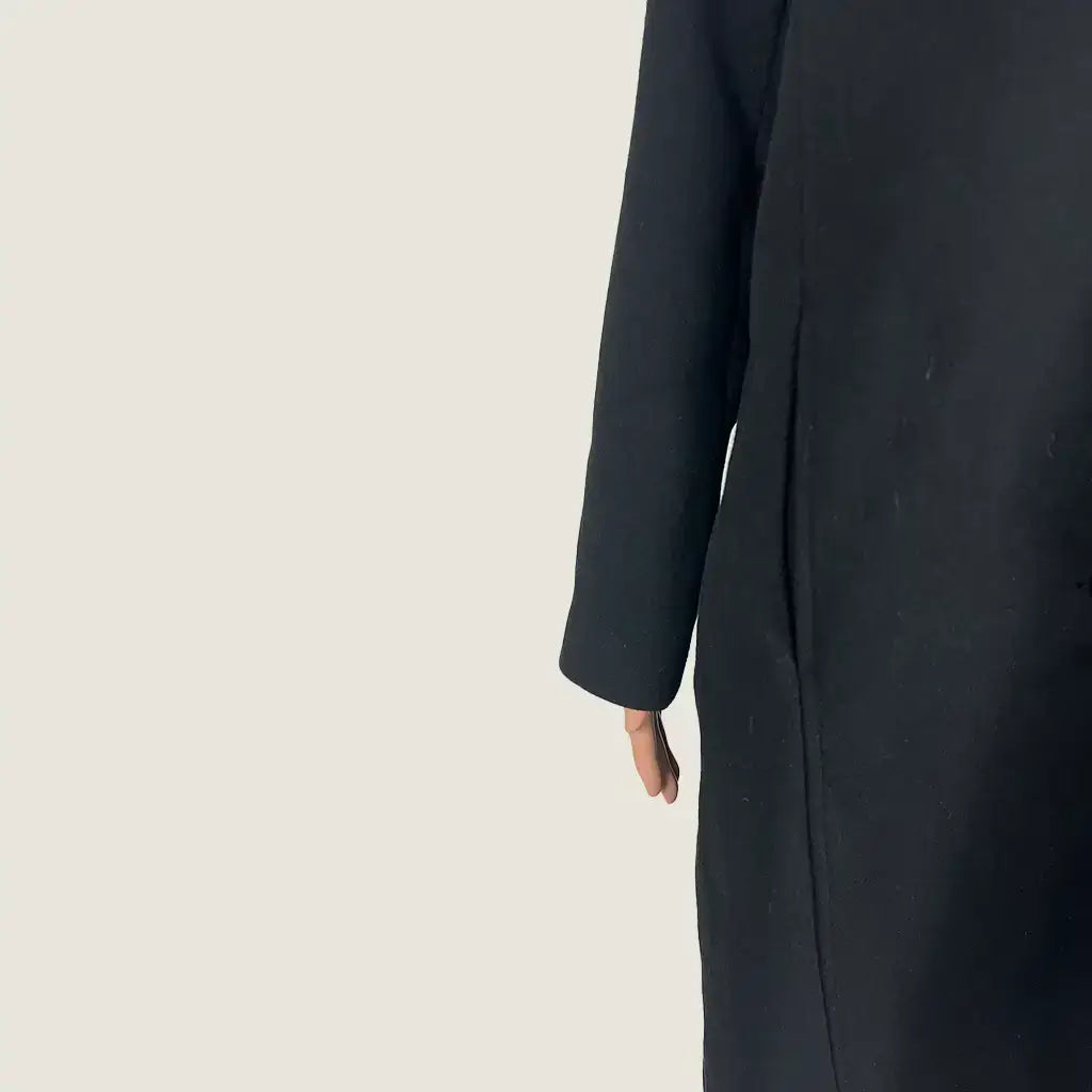 Side Detail View of the Liz Jordan Faux Fur Collar Coat