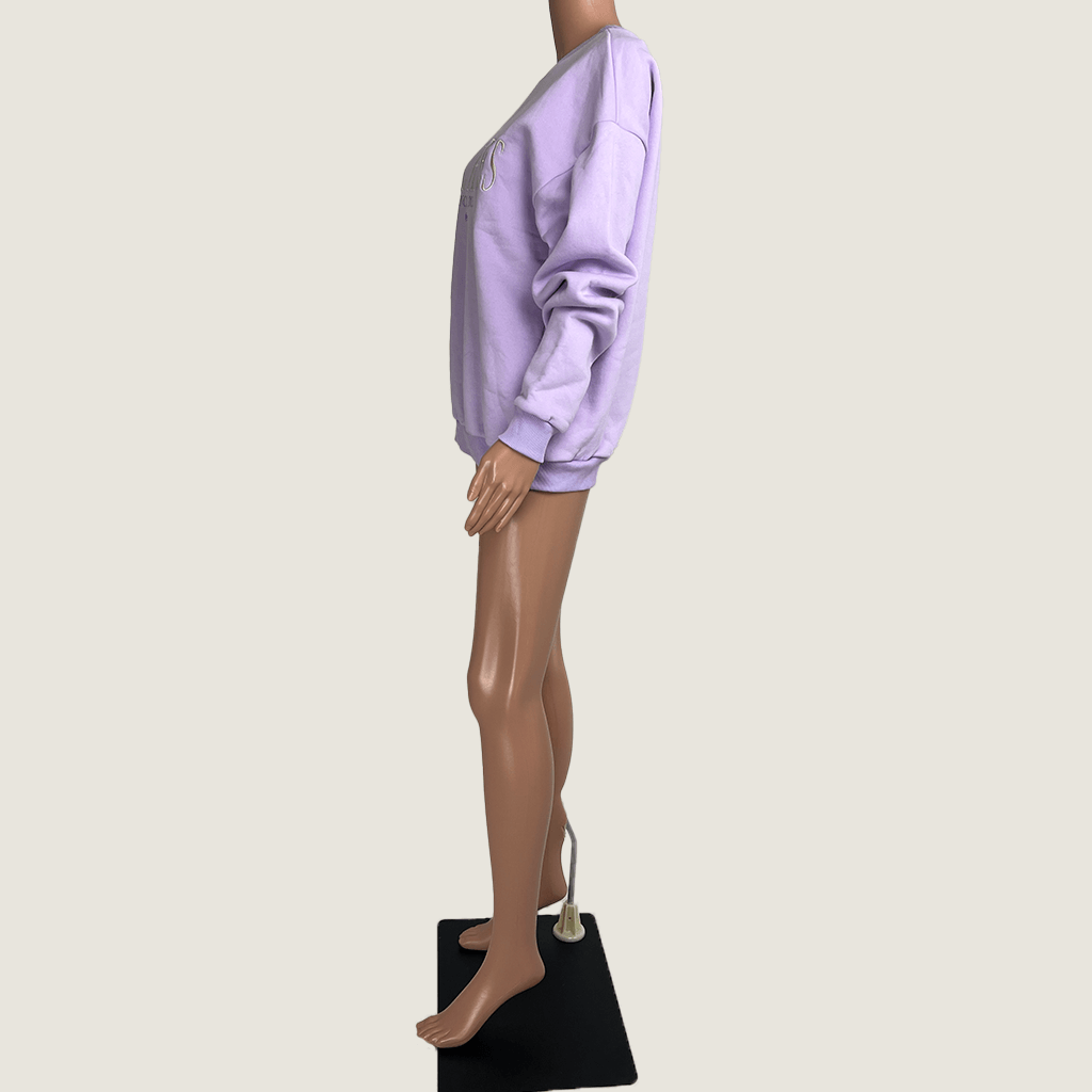Side view of the Local Hero lavender sweater