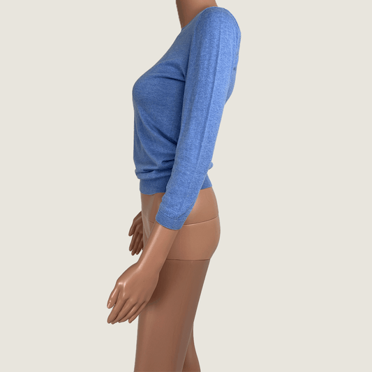 Side view of Marcs Light Weight Baby Blue Sweater with 3 quarter sleeves