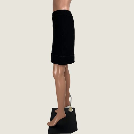 Side view of the Max & Co. black straight mini skirt