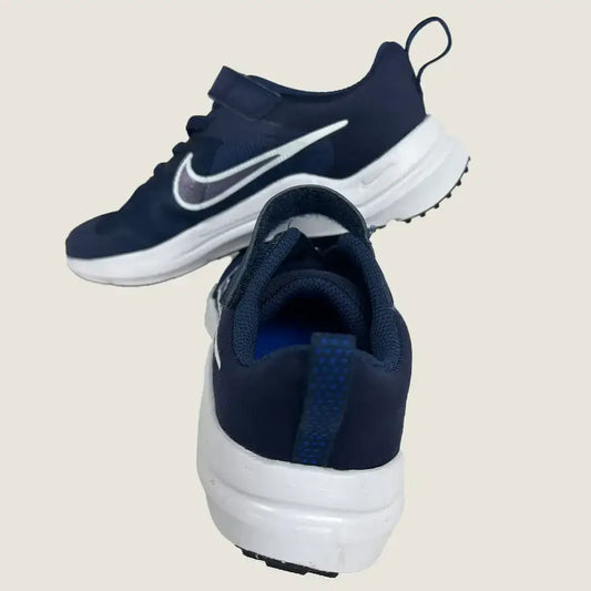Front View of the Nike Downshifter 12 Next Nature GS Kids Running Shoes