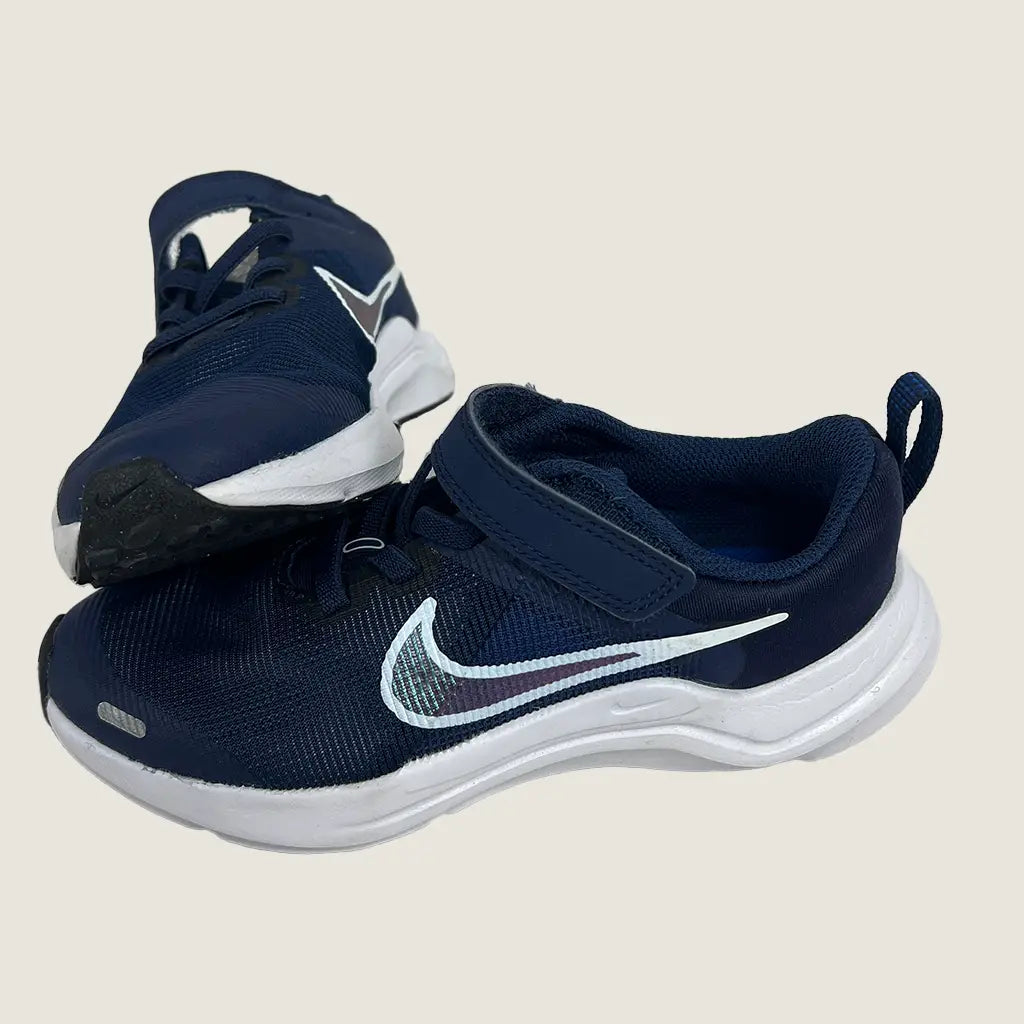 Side View of the Nike Downshifter 12 Next Nature GS Kids Running Shoes