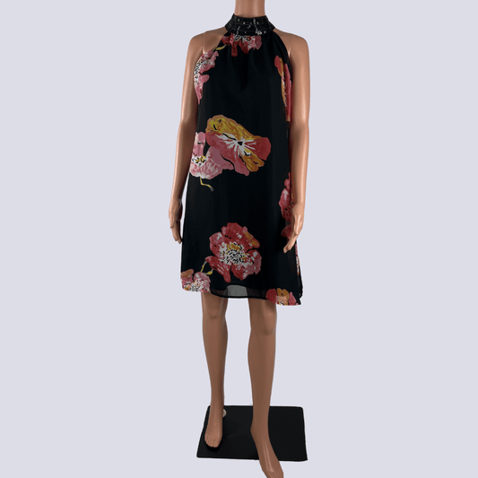 Front view of the Now baby doll midi dress