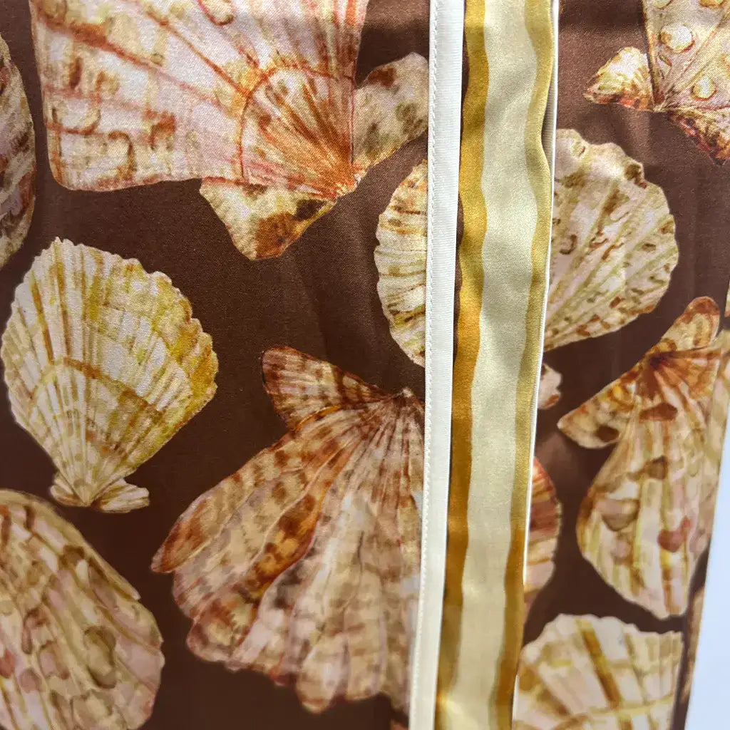 Print Detail View of the Odet Stripe Seashell Silk Pant in Brown