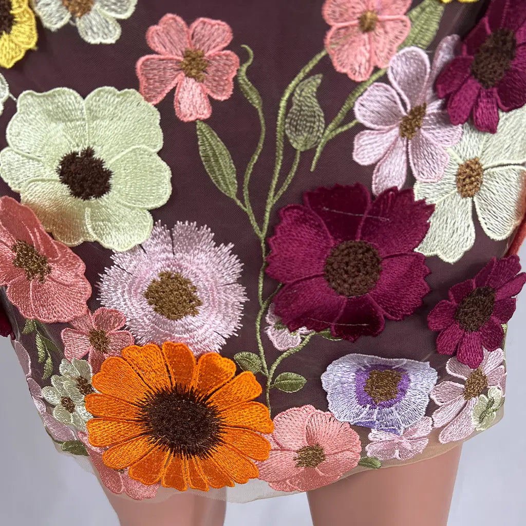Front Hem View of the Pink Diamond Strapless Flower Mini Dress