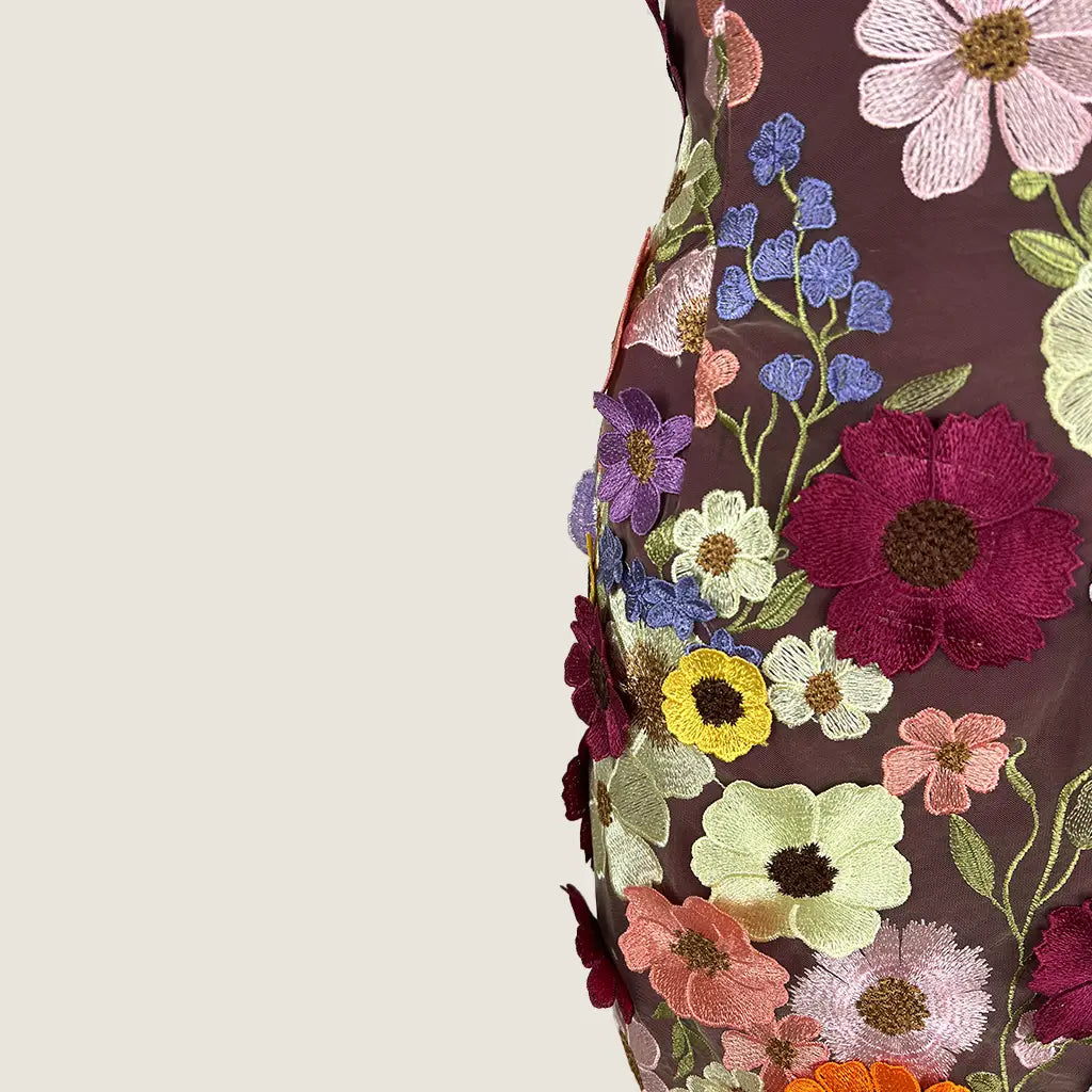 Side View of the Pink Diamond Strapless Flower Mini Dress