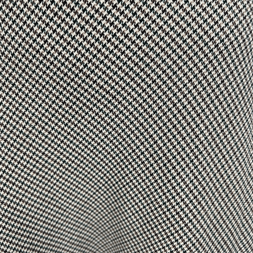 Close up view of the Fabric on the Premise Studio tweed midi