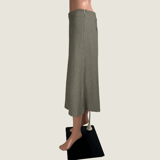 Side view of the Premise Studio tweed midi