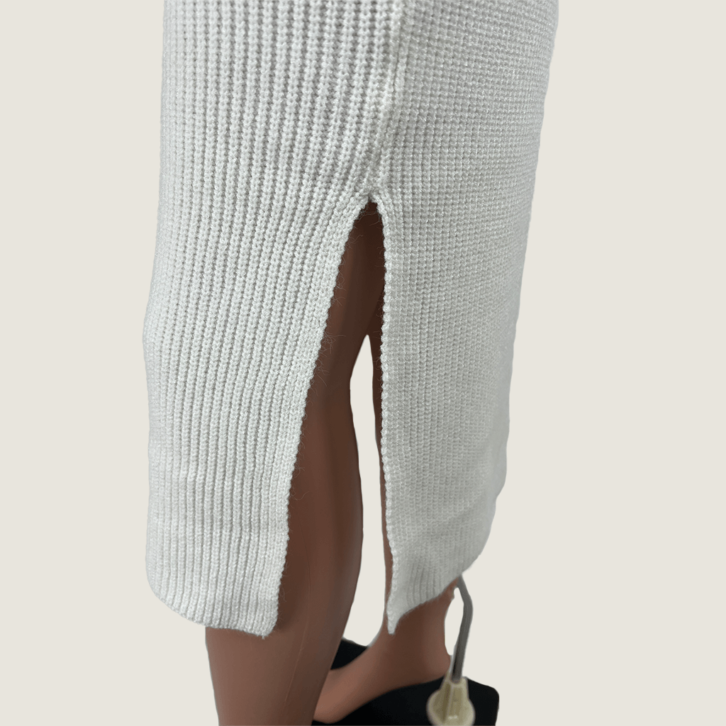 Front close up view of the split on the Princess Polly Zanna midi knit skirt