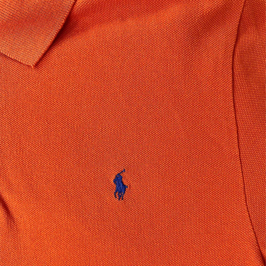 Front logo detail of the orange Ralph Lauren Short Sleeve Men's Polo