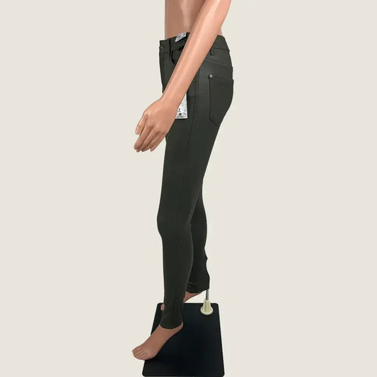 Side View of the Refuse Denim Dark Olive Oil Rigger High Rise Jean