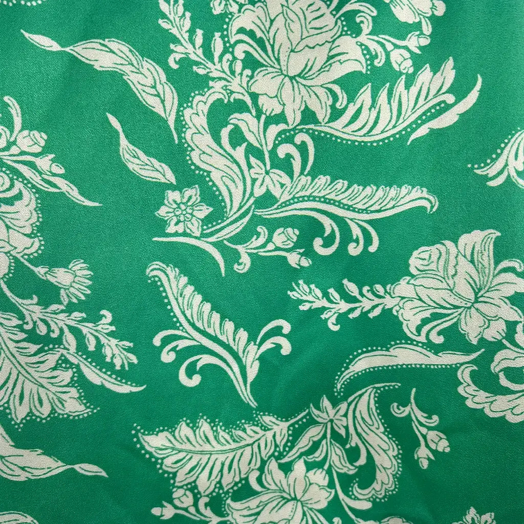 Fabric Detail View of the Sunny Girl Green and Cream Paisley Tank