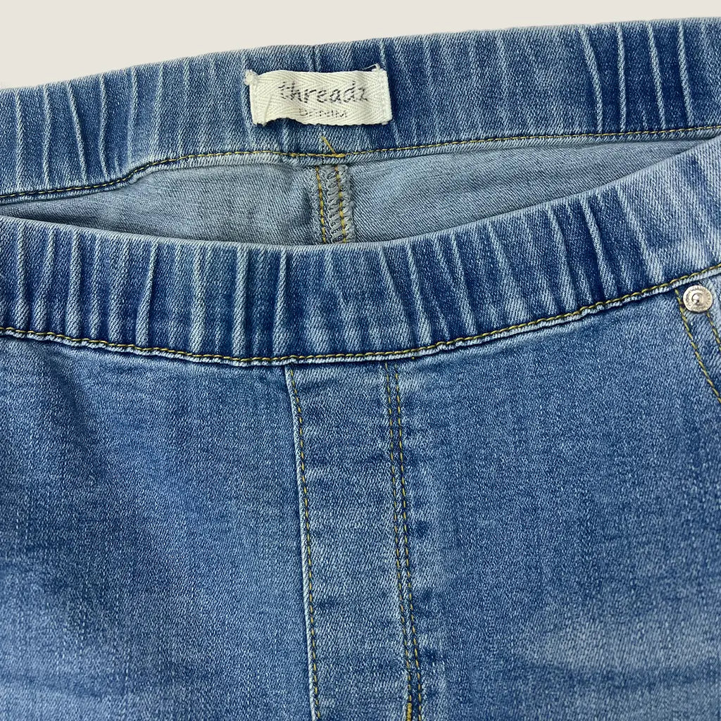 Front Waist View of the Threads Distressed Pull On Jean
