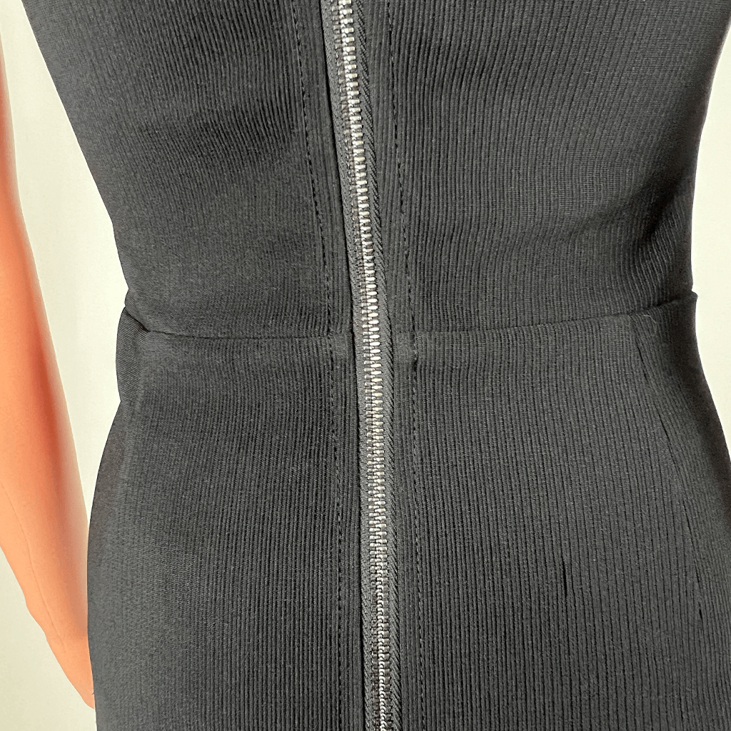 Back close up view of the Tiger Mist Black Sleeveless Cutout Dress