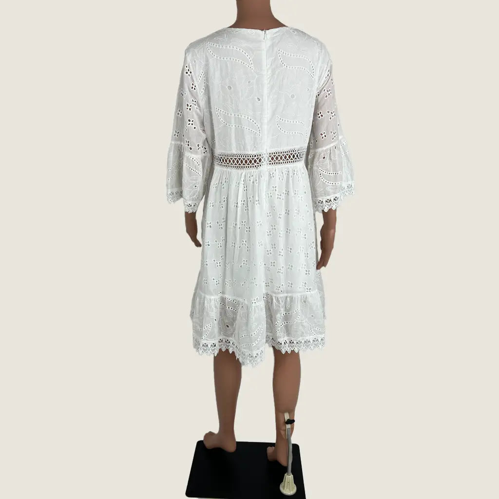 Back View of a White Lace Summer Midi Dress