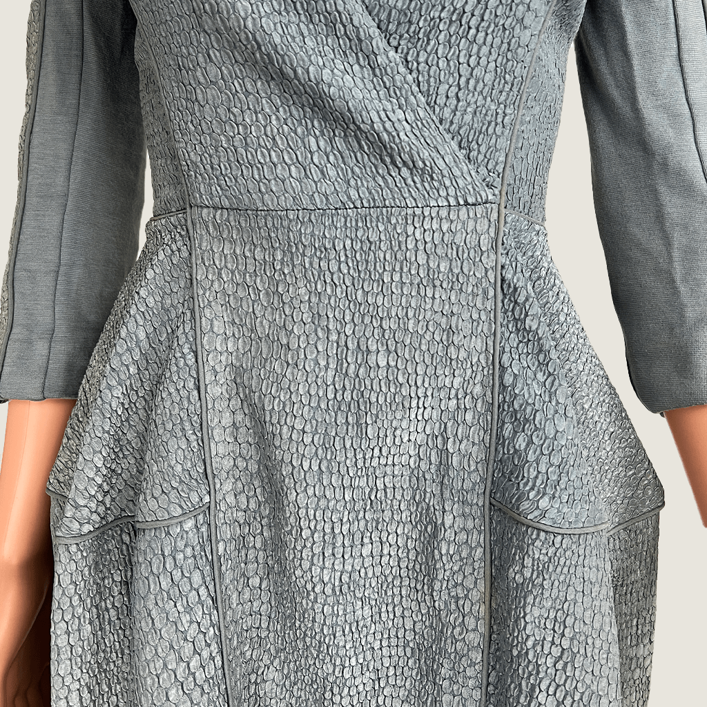 Front close up view of the waist on the Willow blue grey cut out evening dress