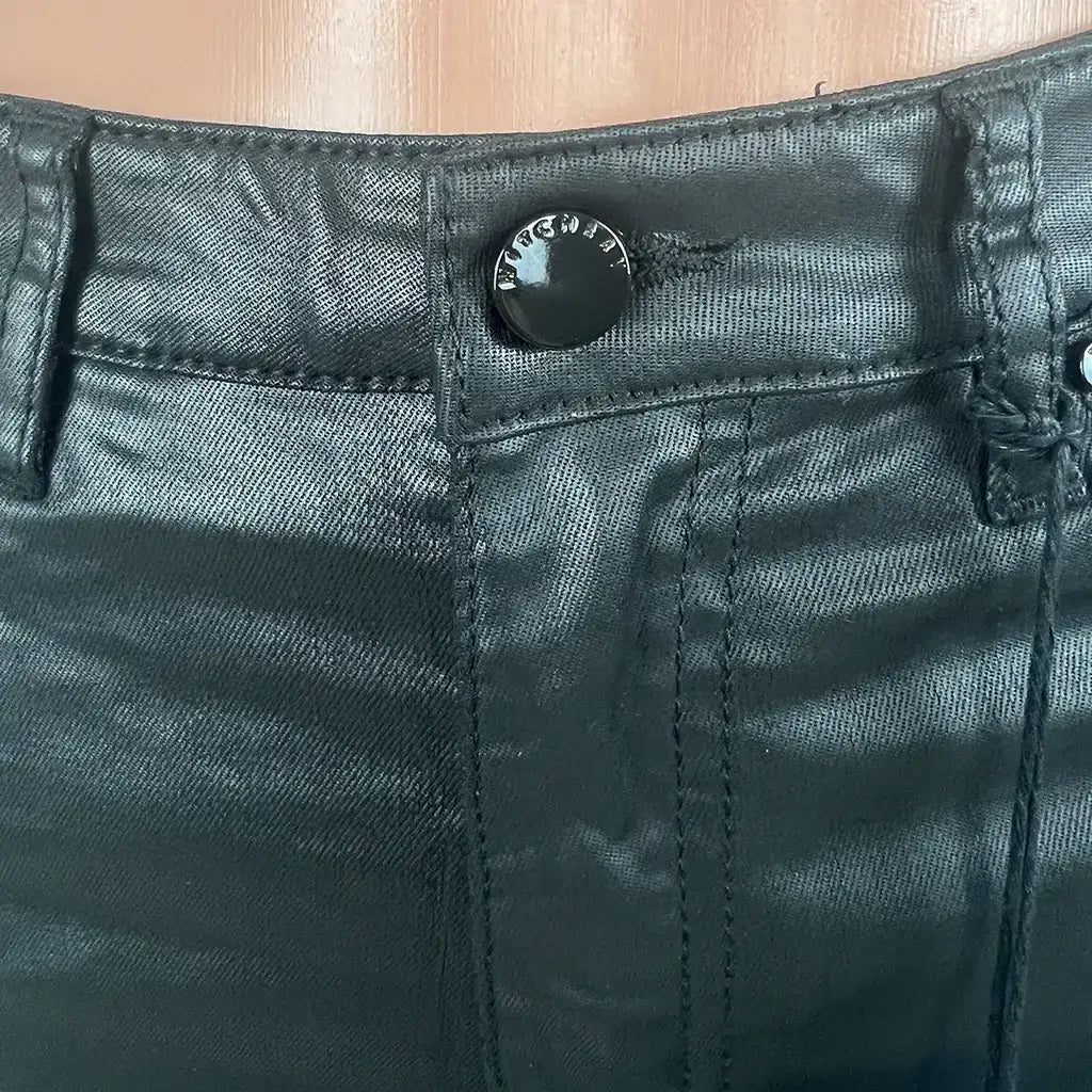 Front view of the women's Witchery Coated 7/8 Skinny Mid Rise Black Jean