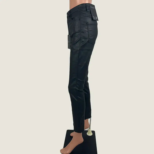 Side view of the women's Witchery Coated 7/8 Skinny Mid Rise Black Jean